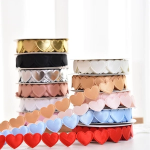 Colorful 3D heart-shaped ribbons in metallic and satin finishes for DIY gift packaging