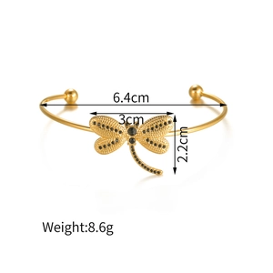 Detailed view showing dimensions of a gold dragonfly bangle with 6.4cm inner diameter