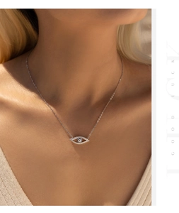 Detailed view of S925 sterling silver evil eye pendant necklace with cubic zirconia