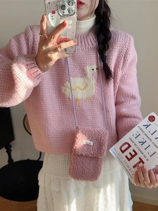 Pink knit sweater with duck pattern and matching plush crossbody mini phone bag