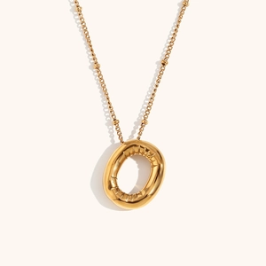 Minimalist 18K gold plated stainless steel necklace with textured circular pendant