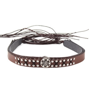Detail of dark brown braided rope belt with retro steampunk gear buckle and silver studs