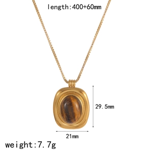 Detail of vintage gold box chain necklace with oval tiger eye stone and size specs