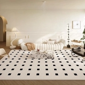 Detail of cream minimalist carpet showing waterproof material and black geometric squares