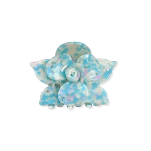 Elegant blue acetate flower hair claw clip with stylish terrazzo patterns for women