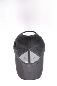 Detail view of cotton baseball cap interior showing breathable fabric and metal buckle