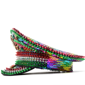 Detail of colorful sequins and metallic punk spikes on this festive captain hat