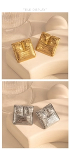 Detail view showing textured square geometric earrings in polished gold and silver finishes