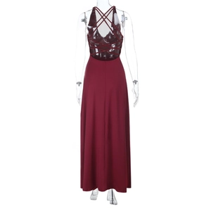 Detail view of burgundy backless maxi dress with criss-cross tie-back straps design