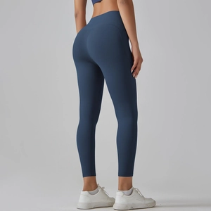 Achteraanzicht van hoge taille yoga legging met corrigerende naden in donkerblauw