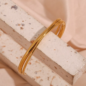 Minimalist double-layer crossover open bangle in 18K gold plated stainless steel