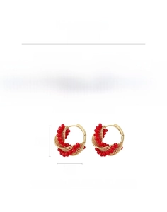 Detail showing red glass bead hoop earrings with golden twisted wire 2cm x 2cm size