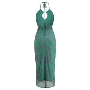 Back view of bodycon halter dress featuring green and purple wavy print and open back design