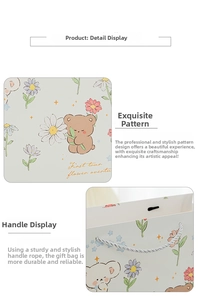 Close-up of thick paper gift bag with cartoon bear print and silver braided handle