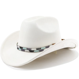 Detail of white western cowboy hat featuring a geometric beaded hatband on wide brim