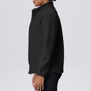 Side view of black fleece-lined athletic jacket with high neck zipper and elastic cuffs