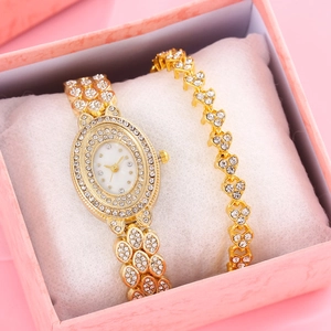 Elegant gold-tone women's quartz watch and heart bracelet gift set in pink box