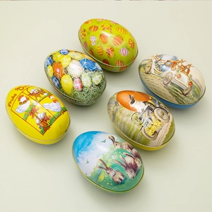 Group of six Easter tin eggs with bunny and chick patterns for candy storage