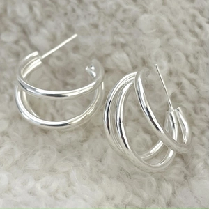 Silver S925 sterling silver multilayer C-shaped geometric hoop earrings on white fur