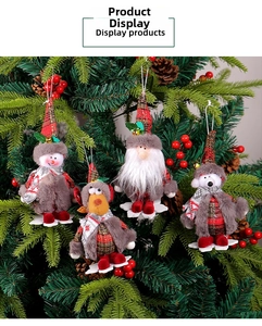 Set of four plush Christmas ornaments including snowman and reindeer on a festive tree