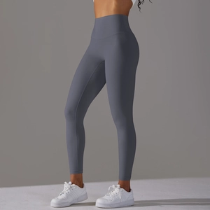 Vue latérale du legging de yoga gris taille haute avec effet galbant fessier push-up