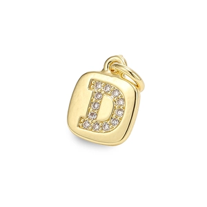 Close-up of golden letter D pendant with micro-paved sparkling cubic zirconia stones