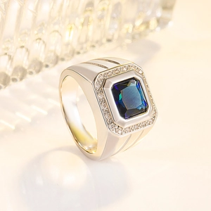 Men's silver ring with square blue sapphire and zircon accents in bright setting