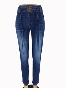 Detail of high waisted blue denim jeans with three-button closure and slim fit design