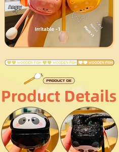 Macro detail of the panda-shaped wooden fish toy with a yellow mallet for stress relief