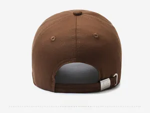 Detailed back view of a brown cotton baseball cap with an adjustable silver metal buckle