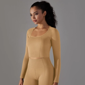Detailed close-up of textured waffle knit fabric on the seamless long sleeve yoga top