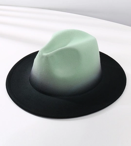 Detailed top view showing the mint green and black gradient texture on the felt jazz hat