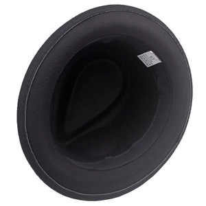 Detail view of the black fedora hat interior showing cotton lining and size label