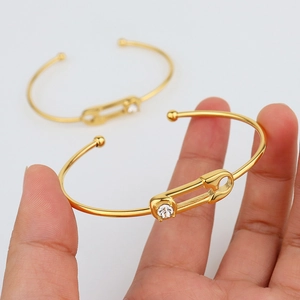 Polished gold safety pin bracelet with white zircon inlay for women in luxury style