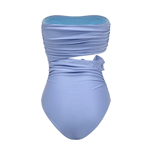 Detail view of lavender one-piece swimsuit with cutout waist and 3D textured pleats