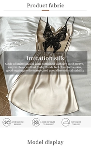 Detail of champagne satin nightdress featuring black lace butterfly embroidery on back