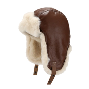Winter pilot trapper hat in brown leather with white faux fur lining and ear flaps