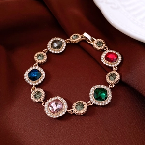 Close-up of vintage multi-color crystal bracelet with rose gold plating and diamonds