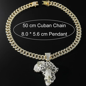 Detail view of gold Cuban chain and leopard head pendant with crystals and dimensions