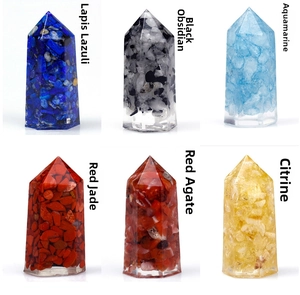 Macro display of resin crystal pillars with Lapis, Aquamarine and Citrine stones