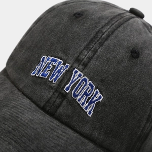 Vintage washed dark gray baseball cap with 3D New York embroidery and distressed fabric