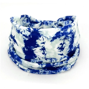 Detailed close-up of blue and white tie-dye stretchy cotton headband with soft texture