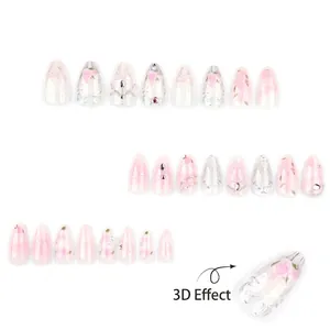 Pink gradient press-on nails with 3D roses, butterfly bows, and pearl rhinestone accents