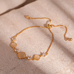 Bracelet doré ajustable avec pierres oeil de chat vintage et zircons étincelants