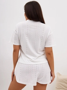 Detailed back view of white eyelet hollow texture on comfortable two-piece pajama set