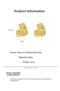 Detail view of gold C-shape twisted earrings showing 2.2cm height and 2.0cm width dimensions