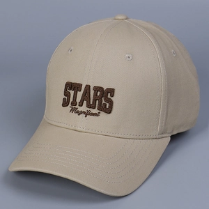 Detail of STARS Magnificent 3D brown embroidery on a beige cotton baseball cap