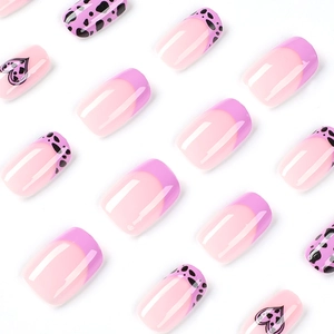 Short round purple heart and leopard print press on nails with French tips and pink base