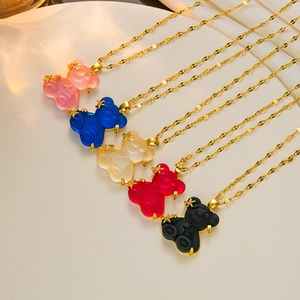 Charming bear pendant necklaces in five colors with gold star accents on a gold chain