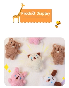 Close-up of cute plush animal keychains with curly fur texture and embroidered details